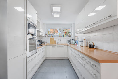 ERFOLGREICH VERMITTELT - Modernes Reihenmittelhaus mit Garten in Stuttgart-Stammheim
